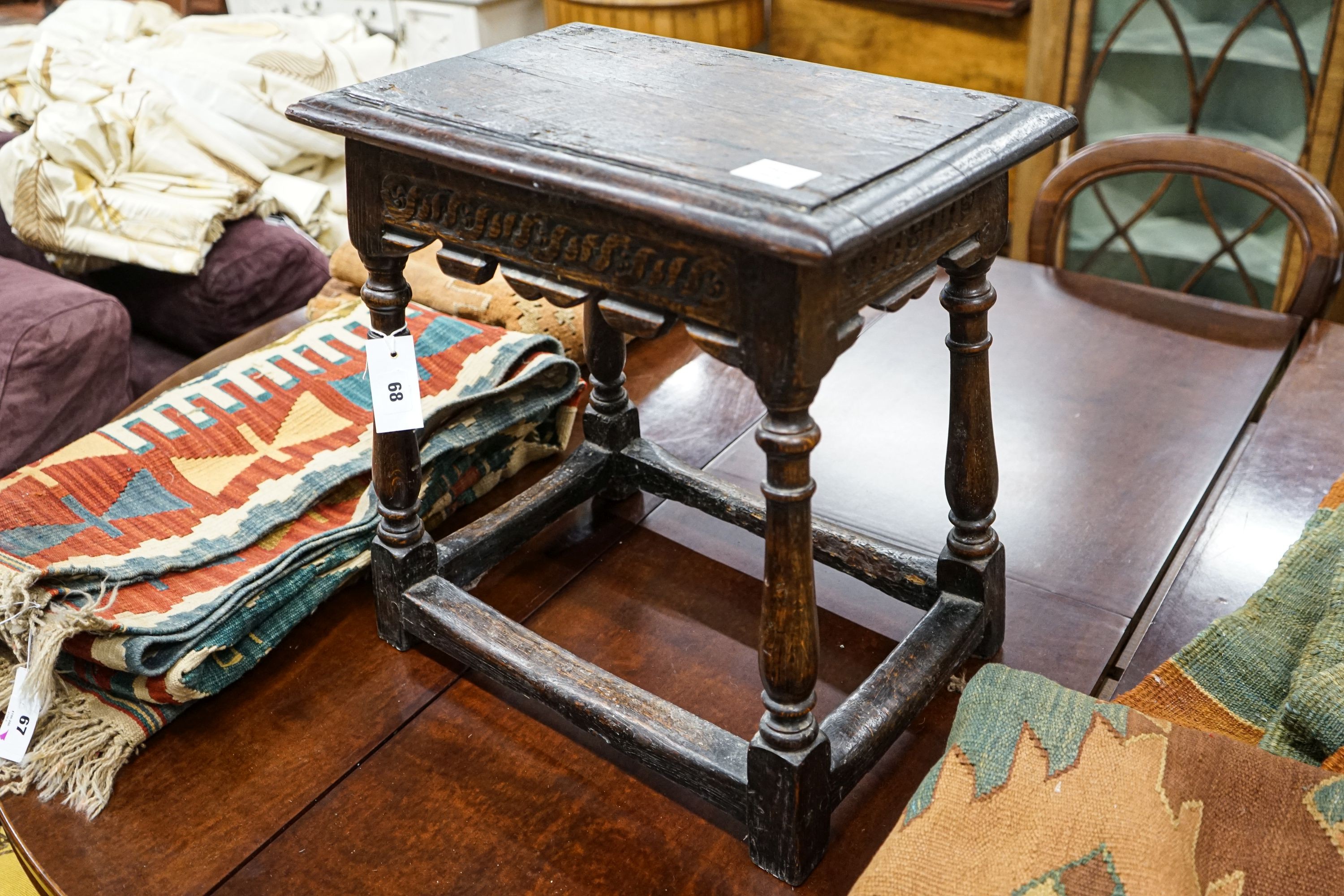 A 17th century style oak joint stool, width 46cm, depth 30cm, height 48cm